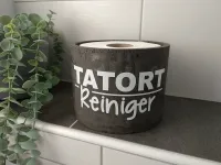 Toilettenpapier-Aufbewahrung grau mit Aufschrift | Der Tatortreiniger